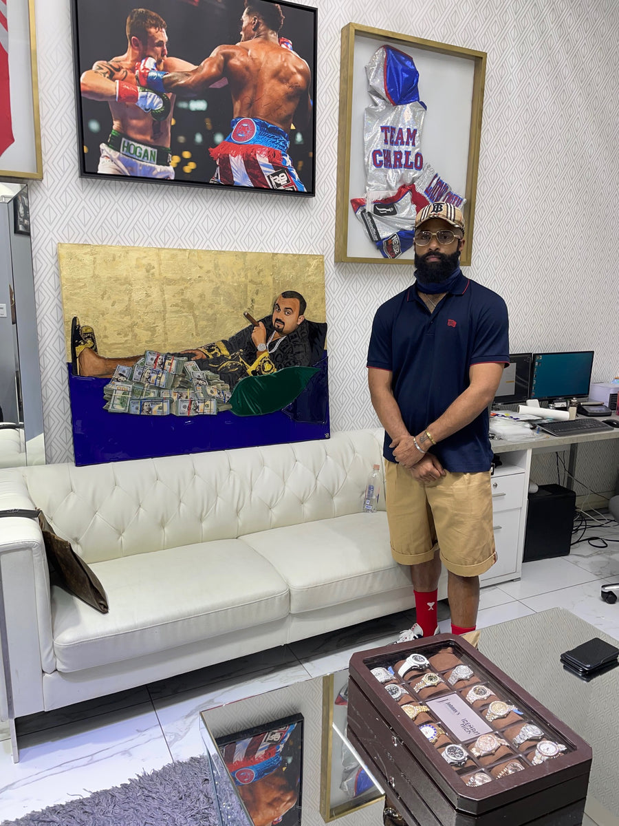 Black artist embracing his collectors latest portrait